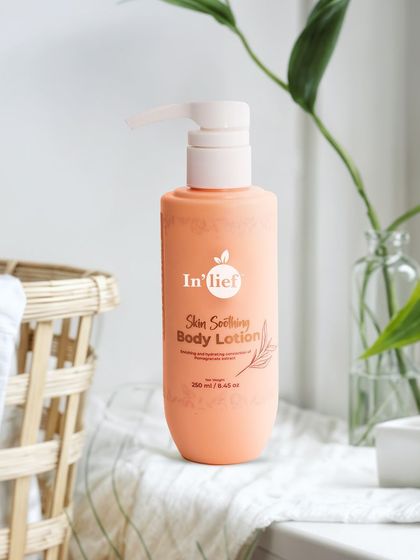 A lifestyle shot of In'lief body lotion in a bathroom setting. Placing the product in a realistic environment helps customers imagine it in their own homes.