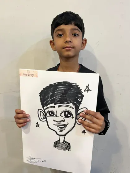 A young guest proudly holding his caricature. Kids are always fascinated by the drawing process and love their portraits.