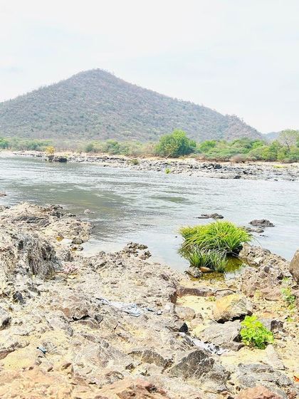 Standing by the Kaveri river at Hogenakkal, with the distant hills framing the scene.