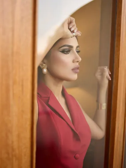 Painting the town red with Bhumi Pednekar in this Rohit Gandhi and Rahul Khanna pantsuit. This look is the definition of power dressing, with its sharp tailoring and bold color making a strong statement.