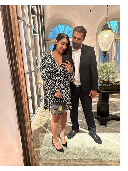 A mirror selfie capturing us, partners in life and at work. Our journey together is the foundation of our firm's collaborative and resilient spirit.