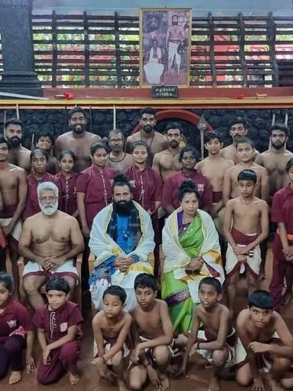 A group photo with the young and senior practitioners of Kalaripayattu in Kerala.