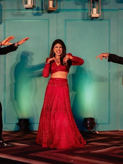 A fun and expressive performance by the bride and her fathers. Choreographing for family members is all about creating simple, memorable steps that bring out their personalities.