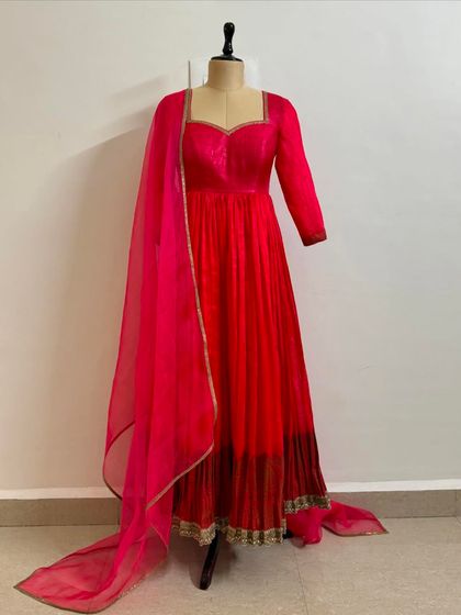 Another full view of the red and pink ombre anarkali gown.