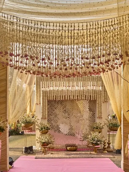 A straight-on view of the enchanting entrance, with its canopy of thousands of hanging flowers creating a breathtaking floral ceiling.