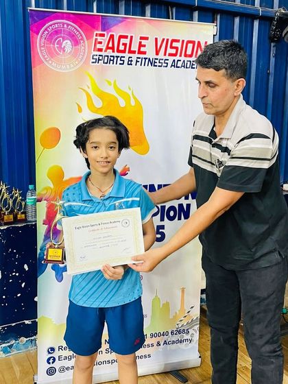 Nitika receiving her certificate and trophy for winning the Eagle Vision Tournament. We encourage our players to participate in a variety of tournaments to gain broad competitive experience.