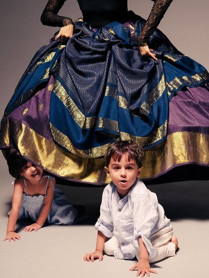 A playful moment from the Kanakavalli sculptural draping series. The image shows how even the most avant-garde concepts can be infused with joy and humanity.