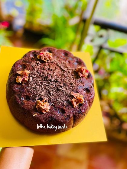 A rich chocolate and rose jam cake, one of the many whole wheat cakes that went out this week. The floral notes of the rose jam pair beautifully with the dark chocolate.