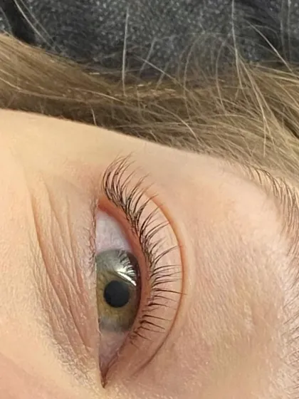 A close-up of a lash lamination by our master Polina. You can see the perfect separation and lift on each lash.