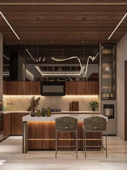 This 3D visualization demonstrates our capability in designing grand, luxurious spaces. We conceptualized an open kitchen with rich walnut wood finishes, a statement marble island with a breakfast bar, and a mirrored ceiling to enhance the sense of space and light. This is how we bring your vision to life before we even begin.