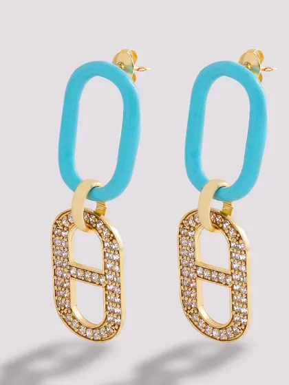 A vibrant product photo of modern link earrings, combining a turquoise blue enamel hoop with a pavé-set crystal link for a pop of color.