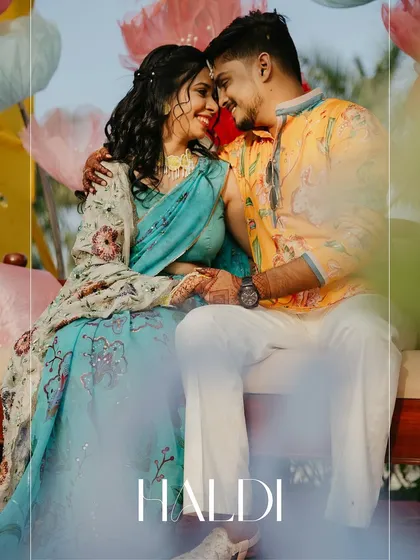 A little haldi, a lot of love. A romantic, candid moment of the couple during their Haldi carnival, surrounded by pastel decor.