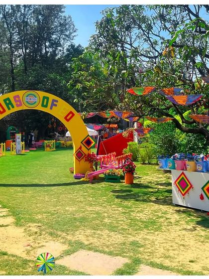 The entrance to the 'Colors of EO' Holi party featured a bright yellow archway, setting a joyful and welcoming tone for the celebration.