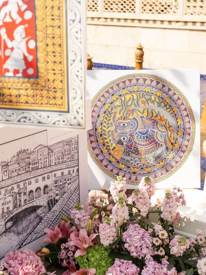 A display of traditional Indian artworks that were part of the interactive painting activity for guests.