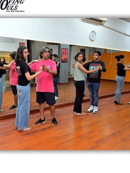 Our instructor demonstrating the correct posture and frame for Salsa partner work. Strong fundamentals are the key to graceful dancing.