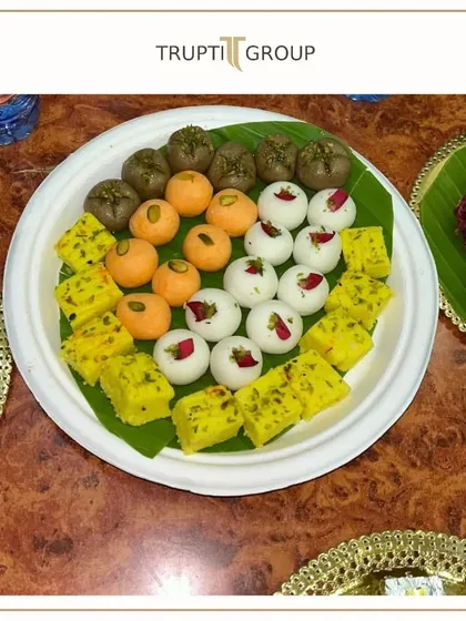 Life's too short to not have a ladoo filled plot twist. A beautiful platter of assorted Indian mithai, including motichoor ladoo, peda, and barfi.