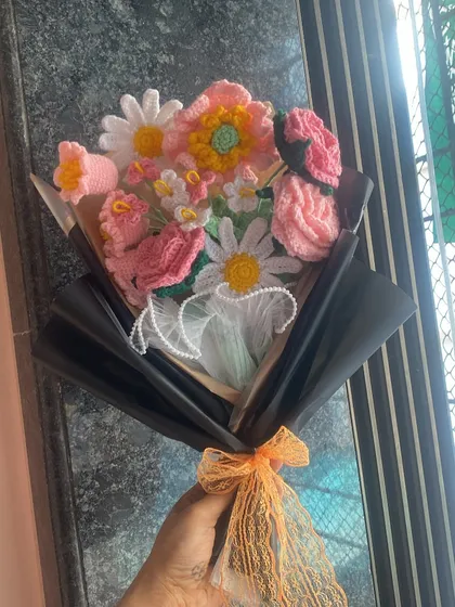 This vibrant mixed bouquet looks so lovely with the light shining through the window, highlighting all the different colors and textures.