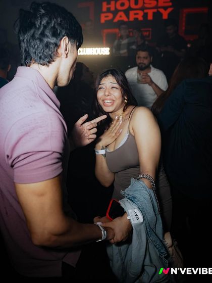 A candid moment of laughter and connection on the dance floor. My goal is to create a space where everyone feels free to have a good time.