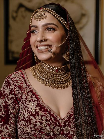 A radiant close-up of the bride, Niesha, her genuine smile lighting up the frame.