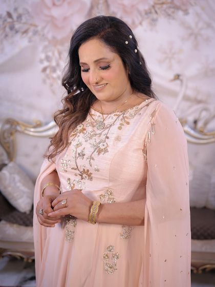 My mom, my princess. I was so happy to doll her up. This candid shot captures her beautiful smile. I gave her a soft, peachy makeup look with gentle curls.