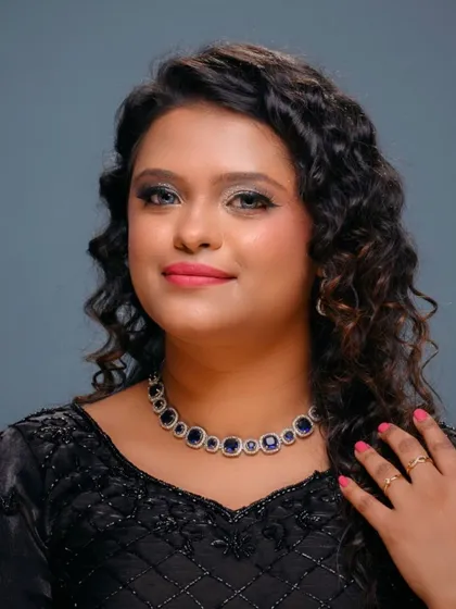 A close-up of a stunning bridesmaid look. I created a silver glitter cut-crease with a sharp winged liner and a soft pink lip, a perfect combination for an evening reception or cocktail party.