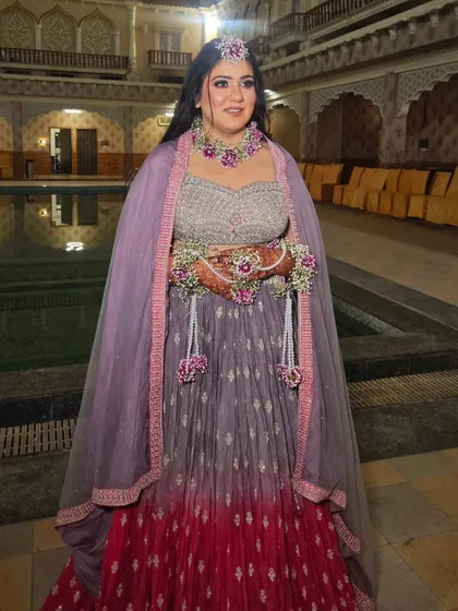 The complete Haldi look by the poolside. The outfit and makeup look absolutely magical in this setting.