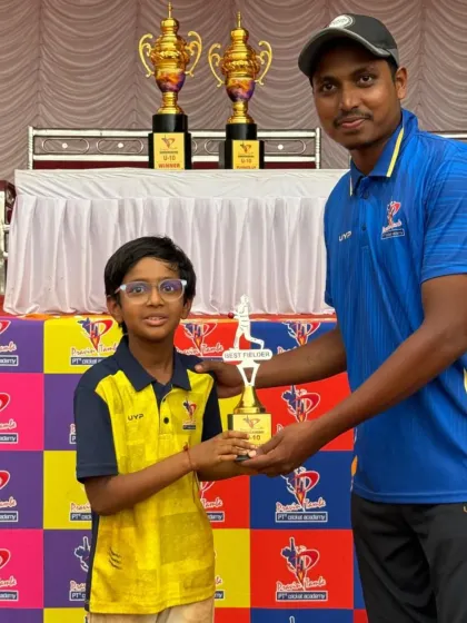 This young player is awarded 'Best Fielder' for his agility and commitment on the field during the U-10 Pravin Tambe Premier League.