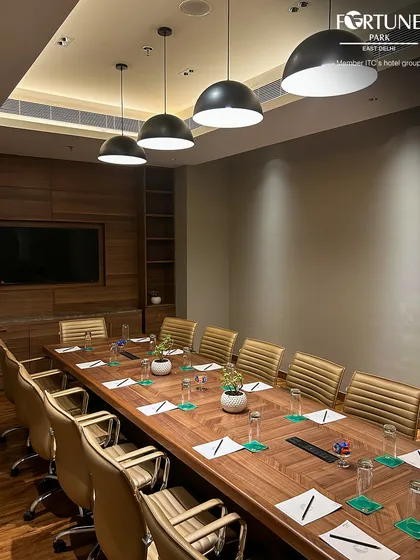 The sleek design of my boardroom is evident from this angle, showing the seamless integration of technology and comfort. It is an ideal space for hosting clients or conducting internal team workshops that require a polished environment.