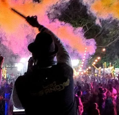 Kicking off a massive Holi festival with a blast of color and sound. This is me in my element, conducting the energy of a crowd of thousands, ready for an unforgettable party.
