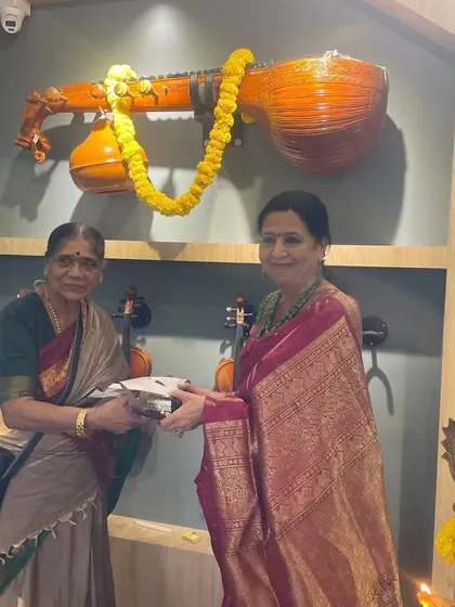 Presenting a gift at the opening of the music store. It's a joy to see the next generation take their passion for music and turn it into something that serves the wider community.