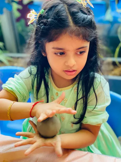 The delicate process of shaping and smoothing the clay. This activity teaches patience and attention to detail in a fun, tactile way.