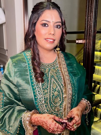 A close-up portrait, highlighting the flawless skin and the soft, defined eyes.