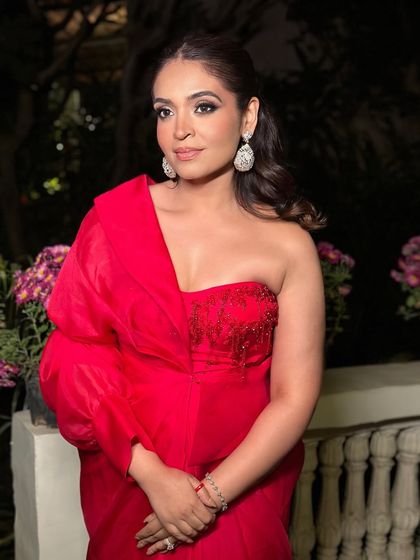 Another shot of my red dress look. As an artist, it's important for me to have my own signature style, which often translates into the looks I create for my clients.