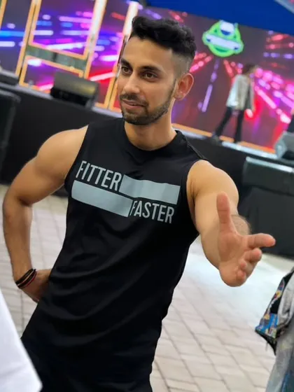 A fun, candid moment where I'm channeling my inner Thor. Fitness should be fun, and I always try to bring a sense of playfulness and humor to my work.
