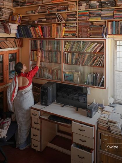 A home for a writer and academic is incomplete without a library. This room is filled to the brim with books, showcasing a life dedicated to learning. The design provides ample storage while keeping the space functional.