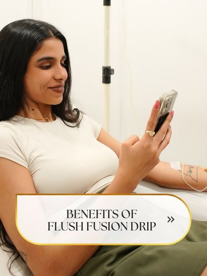 A client relaxes while receiving the Flush Fusion drip. This treatment is a quick and effective way to counteract the effects of stress, travel, and late nights by delivering essential nutrients directly for maximum absorption and benefit.