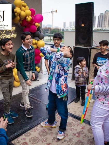 Laughter and fun on the dance floor. Our game coordinator leads the kids in interactive games and dances, ensuring high energy throughout the party.
