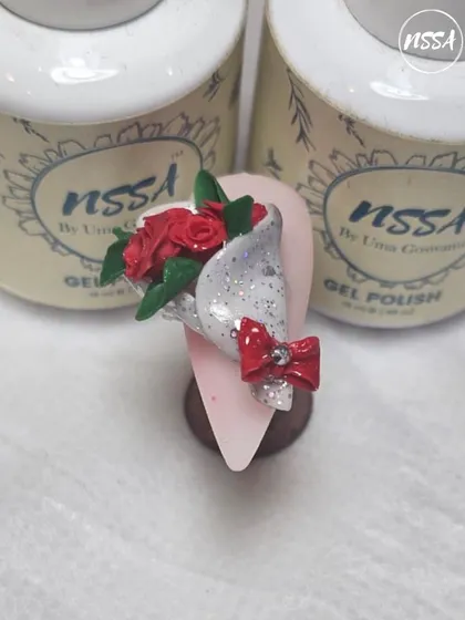 This miniature rose bouquet is sculpted with our 3D gels and sits on a nail painted with NSSA gel polish. The products work together seamlessly to create durable and detailed nail art.
