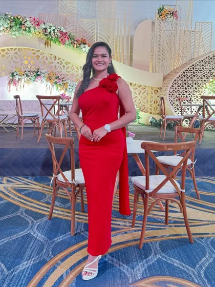 A full-length photo of my red gown for the reception, a classic and elegant choice for a formal evening.