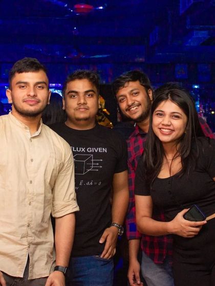 Another group of guys enjoying their time at the pub.