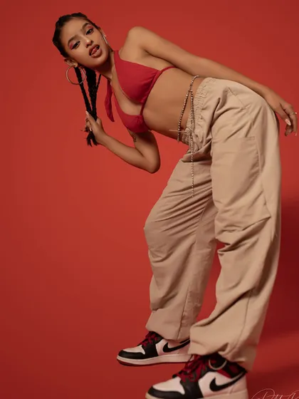A shot from a professional photoshoot, highlighting the strong lines and dynamic poses that are part of my dance language. This image reflects the urban, hip-hop aesthetic I can bring to brand collaborations and portfolio work.