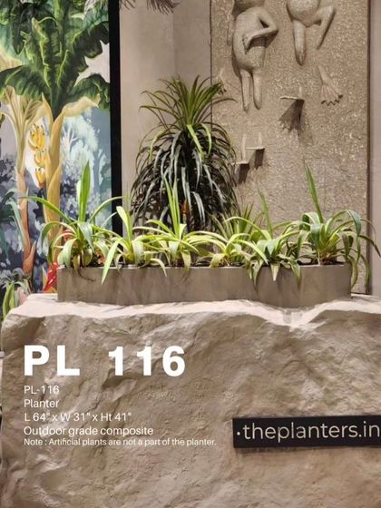 This large, rock-like composite planter is a piece of art in itself. It's designed to blend seamlessly into a natural landscape design.