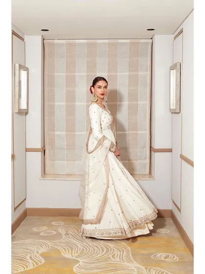The full silhouette of the Jigar Mali Anarkali shows its beautiful flow and elegant drape, a perfect rental for a sophisticated look.