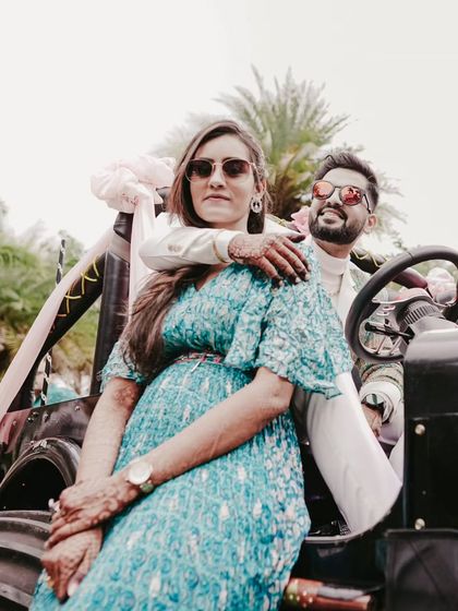 A cool, stylish pose in a decorated monster jeep, perfect for a couple with a bold personality.