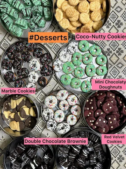 A colorful assortment of my homemade eggless desserts, including brownies, cookies, and mini doughnuts.