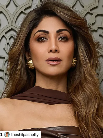 A close-up of the haircut and color I did for the stunning Shilpa Shetty. The style features soft, face-framing layers and a rich "Hot Chocolate" brown color that adds warmth and dimension, styled with gentle waves for a sophisticated finish.