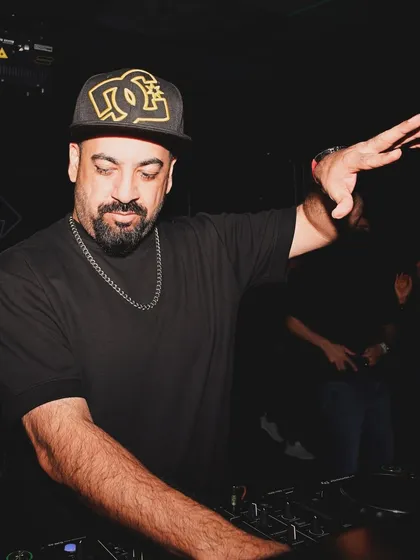 A close-up of me mixing at the decks in Dubai.