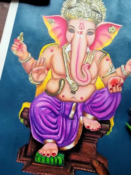 A detailed shot of the Ganesha artwork, focusing on the textures of his dhoti and the intricate jewelry.