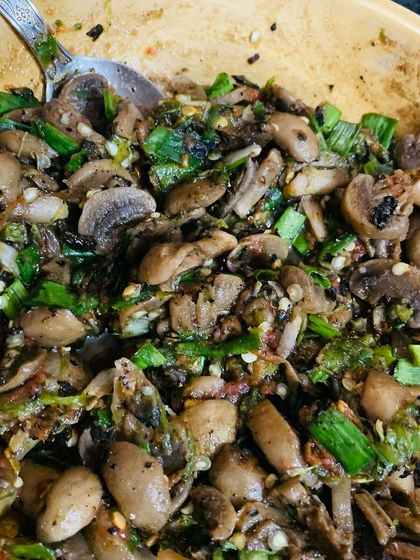 This is another version of mushroom chutney I made for my lunch, using button mushrooms. I mashed them with roasted green chillies, tomatoes, spring onion, garlic, and a bit of dried fish for extra flavour.