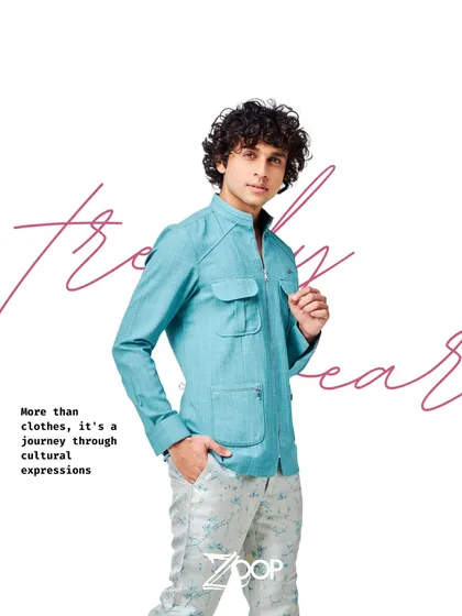More than clothes, it's a journey through cultural expressions. This teal utility shirt paired with printed trousers is a fine example of my sartorial style.